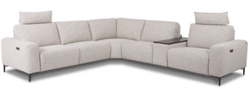 A beige Domus corner sofa with an L-shaped configuration, featuring a low-profile design with adjustable back cushions and a floating sofa aesthetic.