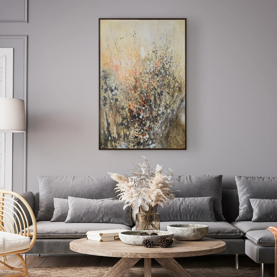 Abstract painting with splashes of orange, black, and white on a beige background