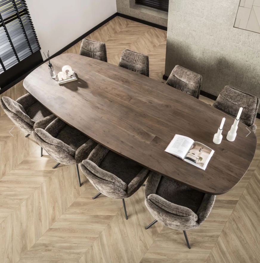 Wooden dining table with a thick base on a white background