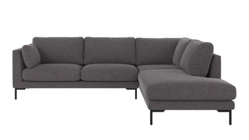 A modern three-seater sofa with a right-facing chaise lounge, upholstered in a textured red fabric, supported by slim black metal legs, shown against a plain white background.