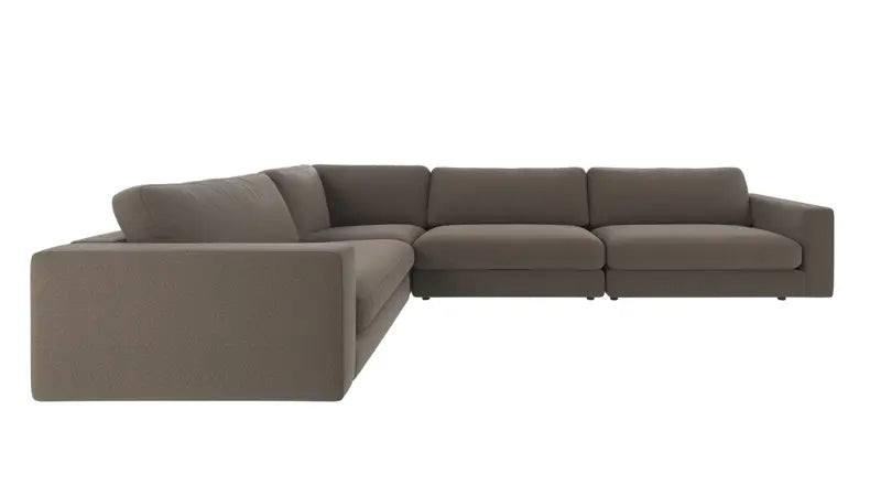An olive green sectional sofa with a left-facing chaise lounge, shown from a side profile view against a plain white background.
