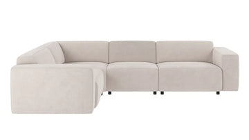 A modern sectional sofa in a light beige fabric, featuring a left-facing chaise lounge and a three-seater section, shown against a plain white background.