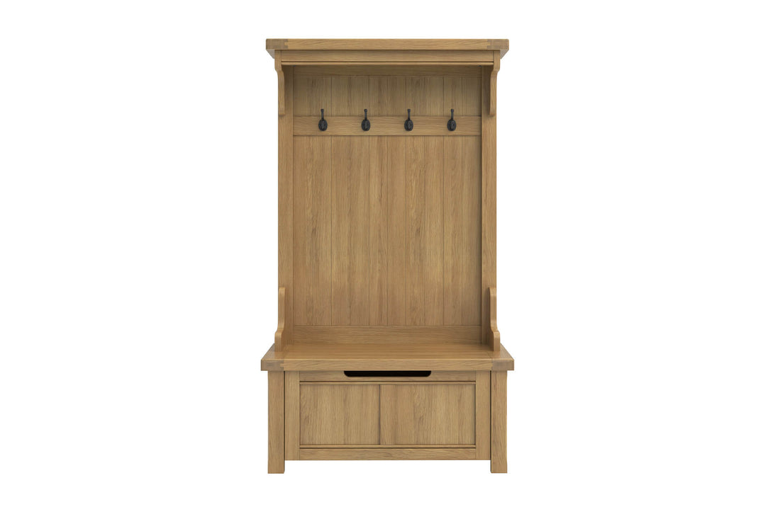 Wooden hall tree with hooks and storage bench on a white background