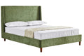 Green upholstered bed with white bedding on a white background