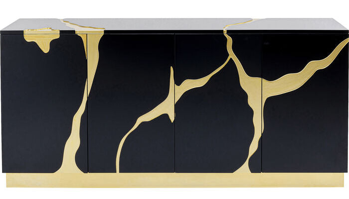 Black console table with gold accents on a white background