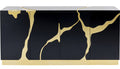 Black console table with gold accents on a white background