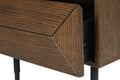 Close-up of a wooden drawer with geometric design on a white background