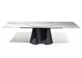 Dining table with marble top and black base on a white background