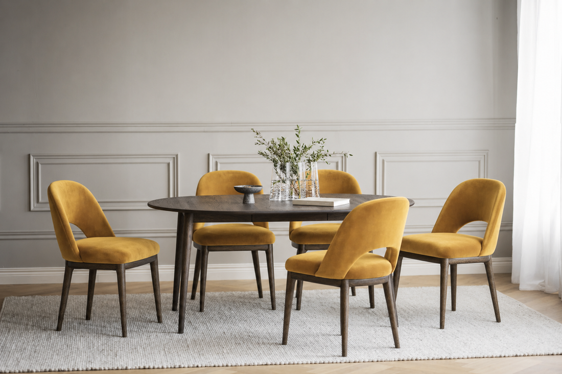 Mustard yellow chair with wooden legs on a white background