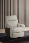 White recliner chair in a room with striped wallpaper
