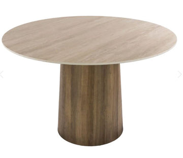 A round dining table with a light beige wood-grain top and a darker brown fluted pedestal base, shown on a plain white background.