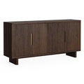 Dark wood sideboard with three doors on a white background