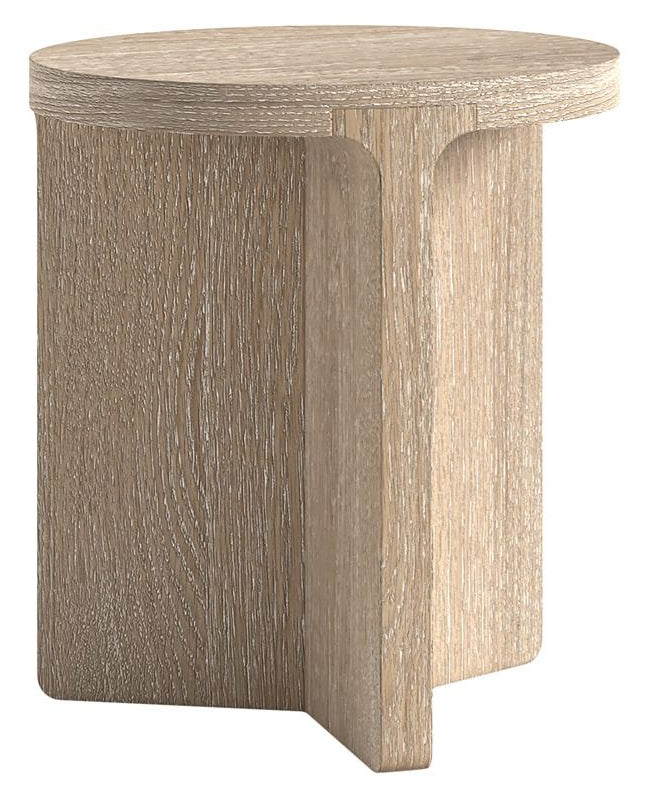 Round wooden side table with a textured surface on a white background