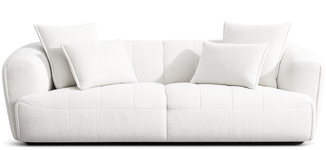 A modern white upholstered sofa with four matching square throw pillows, shown from a front-facing perspective on a seamless white background.