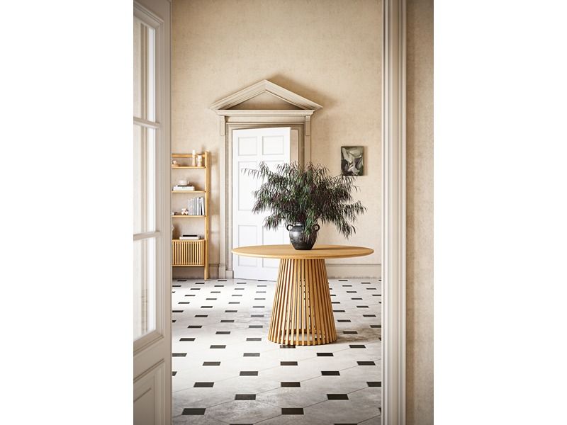 Wooden table with a unique base design on a white background