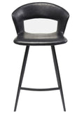 A modern black faux-leather barstool with a curved backrest and slim metal legs, shown against a plain white background.