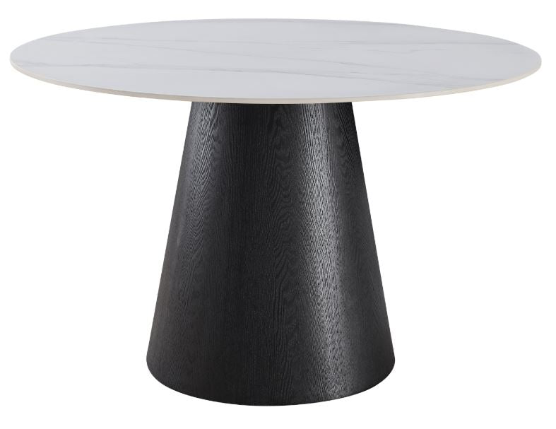 A modern round dining table featuring a white marble-patterned top and a wide, tapered black wood-grain pedestal base, shown against a plain white background.