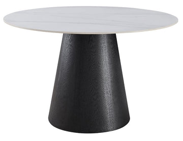 A modern round dining table featuring a white marble-patterned top and a wide, tapered black wood-grain pedestal base, shown against a plain white background.